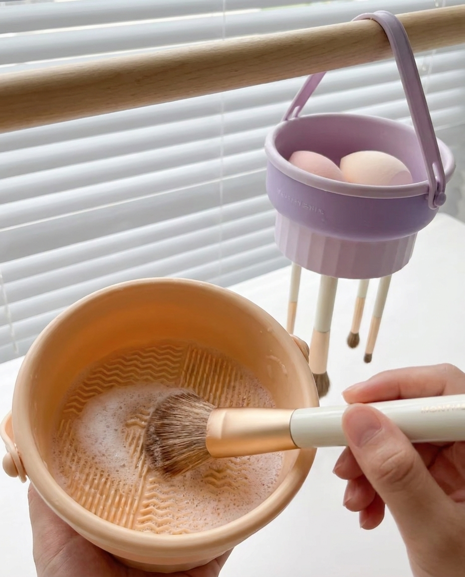 The Brush Cleaning Set holder with brushes hanging above the wash bowl